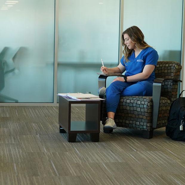 Student taking notes